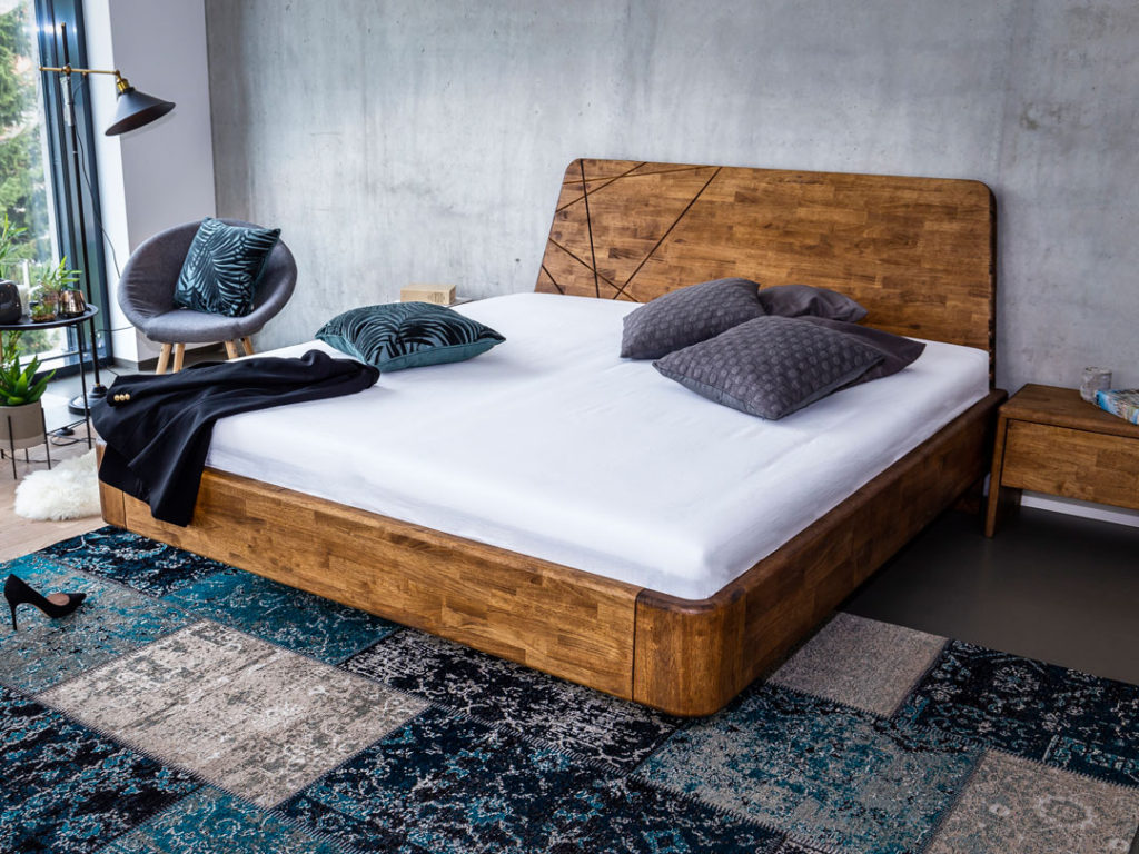 Moderní masivní postel NOE je vyrobena z dřevěného masivního dubu